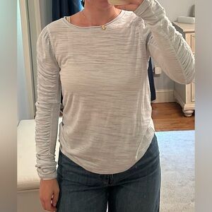 Free people light blue long sleeve top with ruching on sleeves size medium